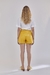 Short con lazo en la cintura, tiro alto con bolsillos. Short simil cuero. Mila Kartei en The Mix. Ediciones limitadas