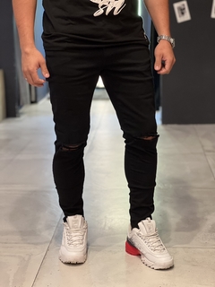 Calça jeans preta destroyed joelho - comprar online