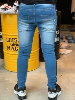 CALÇA JEANS FAIXA LATERAL na internet