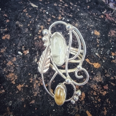Anillo de plata cuarzo cristal y topacio