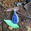 Dije de plata y charoita