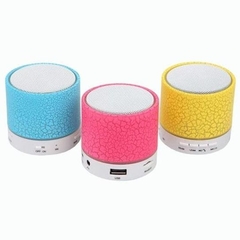 Parlante portátil mini cilindro craquelado con luz
