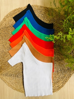 MUSCULOSA TEJIDA UN HOMBRO