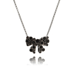 Onyx or crystal quartz encrusted bow necklace - buy online