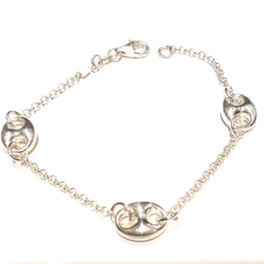 Pulsera rolo de plata italiana con tres dijes inflados ovalados de 19,5 cm largo