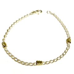 Pulsera grummet estirada de plata y oro 3 mm de grosor y 19 cm de largo