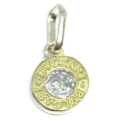 Dije circulo plata y oro con inscripcion en borde y circon transparente central - comprar online