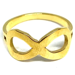 Anillo de acero dorado con infinito calado central nro. 17