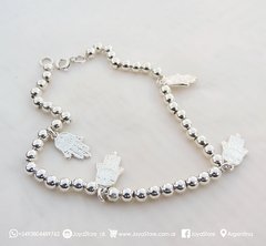 PULSERA DE PLATA CON DIJES