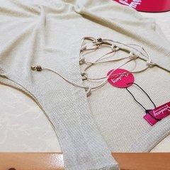 CAMISETA TRANÇADA DOURADA na internet