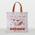 Bolsa friselina con manijas tiras