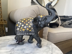 ELEFANTE NARANJA Y NEGRO en internet