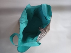 bolso reversible en tela.