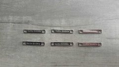 Imagen de chapita con logo - Medida 25 x 4 mm ( Art 3854 ) x 1000 unidades - SISTEMA LASER