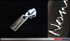 Imagen de TIRACIERRE DE METAL CON LOGO X 1000 UNIDADES - consultar medidas y colores de metal