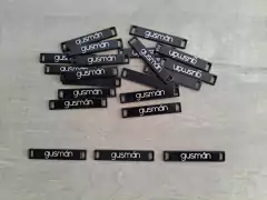 chapita con logo - Medida 35 x 6 mm ( Art 3885 ) x 1000 unidades - SISTEMA LASER en internet