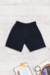 Short de gabardina colegial.