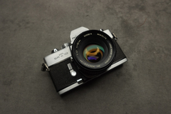 Minolta SRT 101 con optica Rokkor 50mm f 1,7
