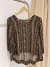 Blusa Brandel estampa víbora T.M