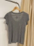 Remera multimarca detalle strass T.M en internet