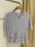 Remera H&M lavanda volados T.S
