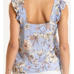 BLUSA CON ESTAMPADO FLORAL CELESTE en internet