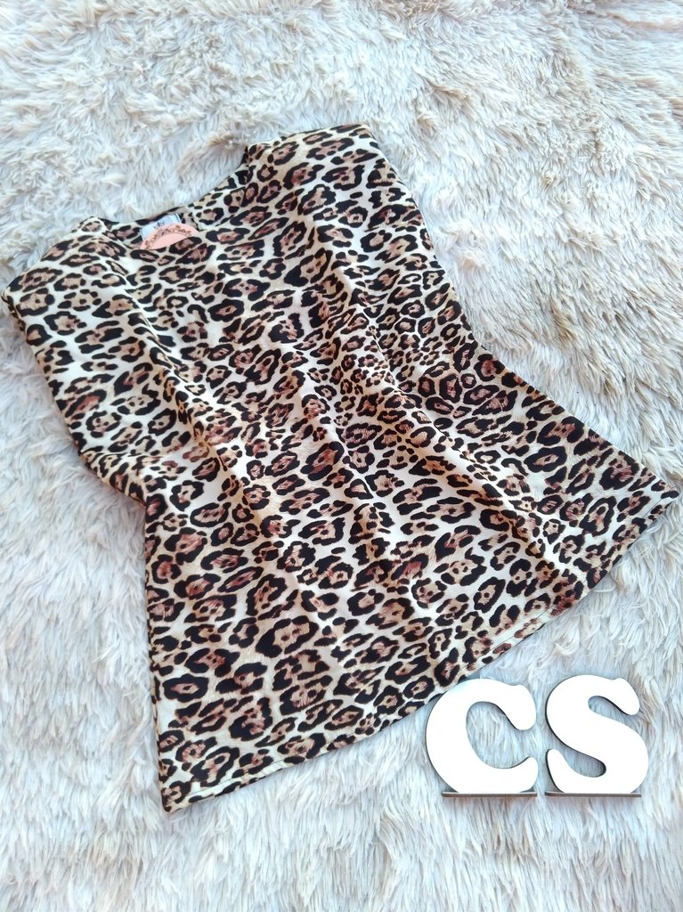 urban outfitters cow print bolsa